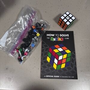 Rubik’s Cube Lot – 2 Cubes + How to Solve the Rubik’s Cube Official Guide